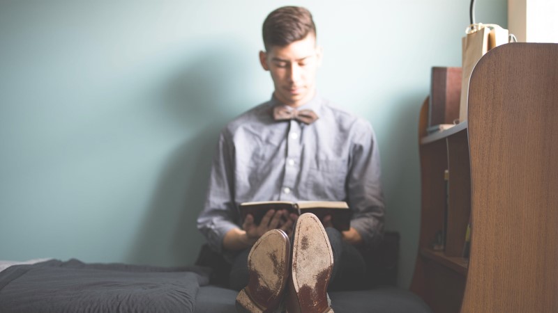 university student studying in accommodation room