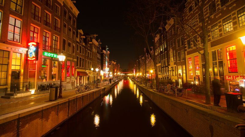 Amsterdam red light district during the night canal view